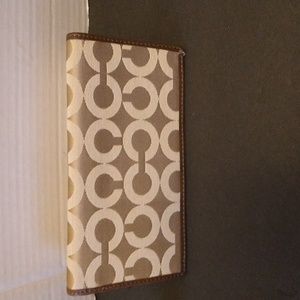 VGUC. Coach Brown and tan checkbook cover.